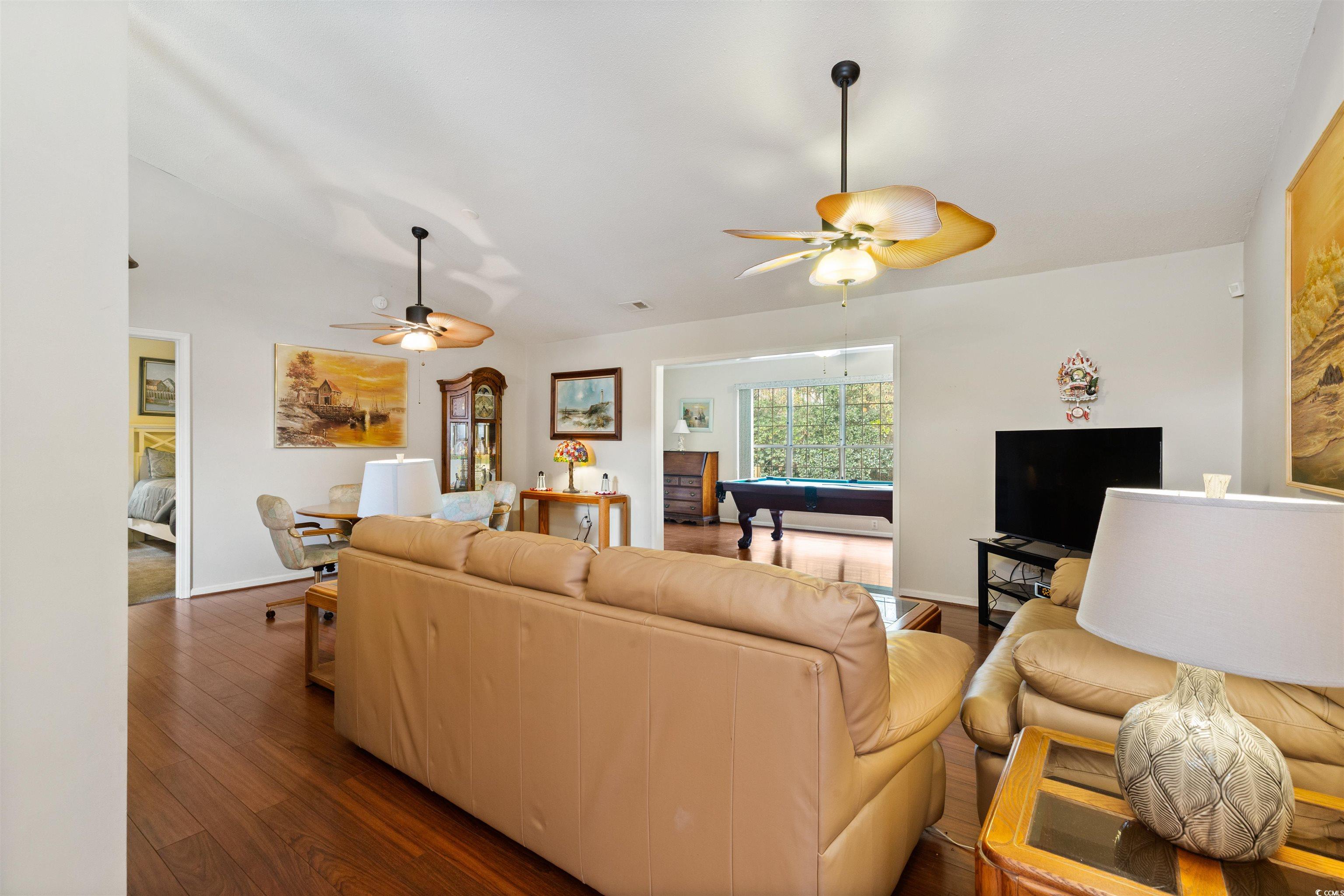 675 Bluebird Lane Murrells Inlet, SC 29576 - Photo 14 of 40 Living area with baseboards, billiards, ceiling fa