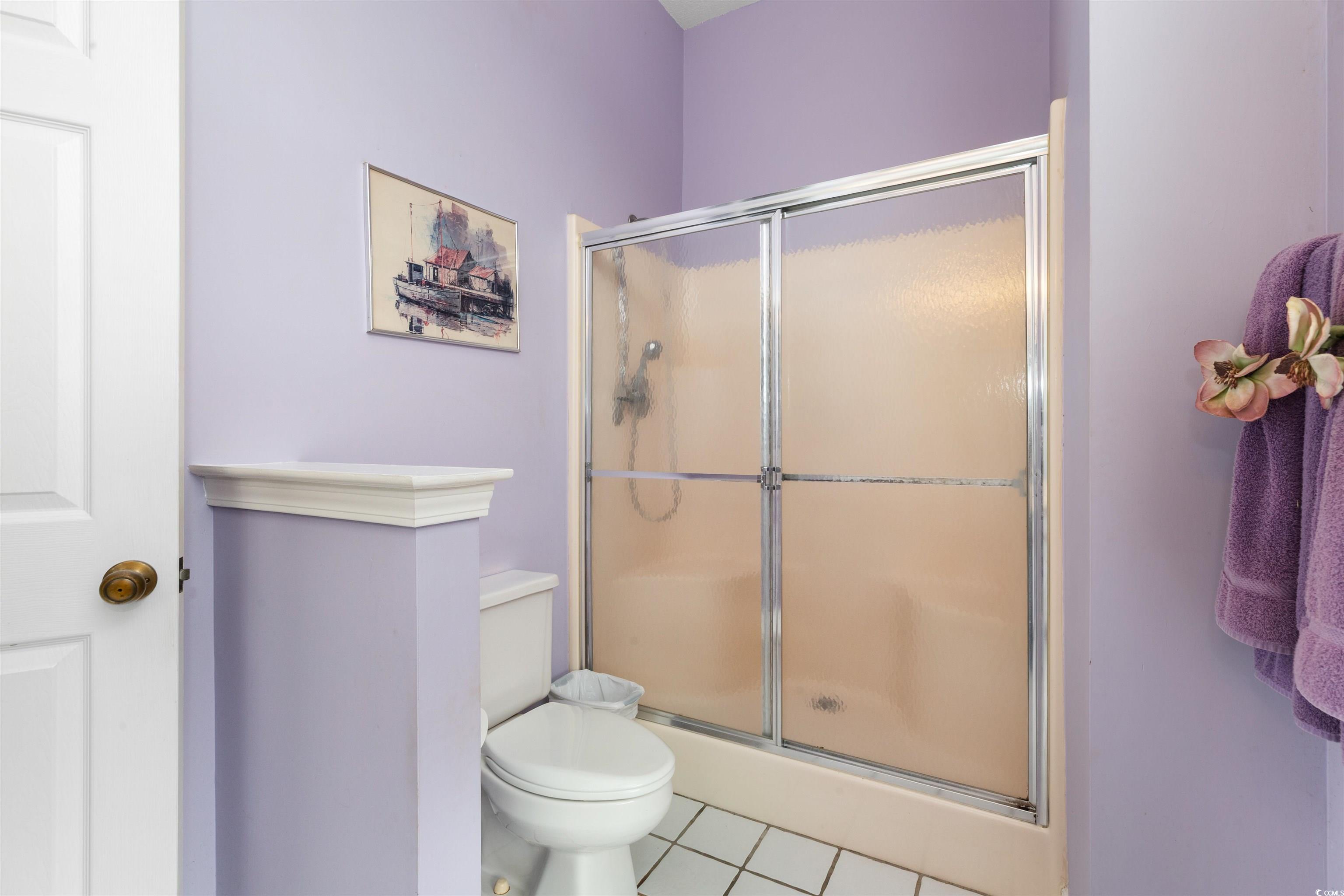 675 Bluebird Lane Murrells Inlet, SC 29576 - Photo 28 of 40 Full bathroom with tile patterned flooring, toilet
