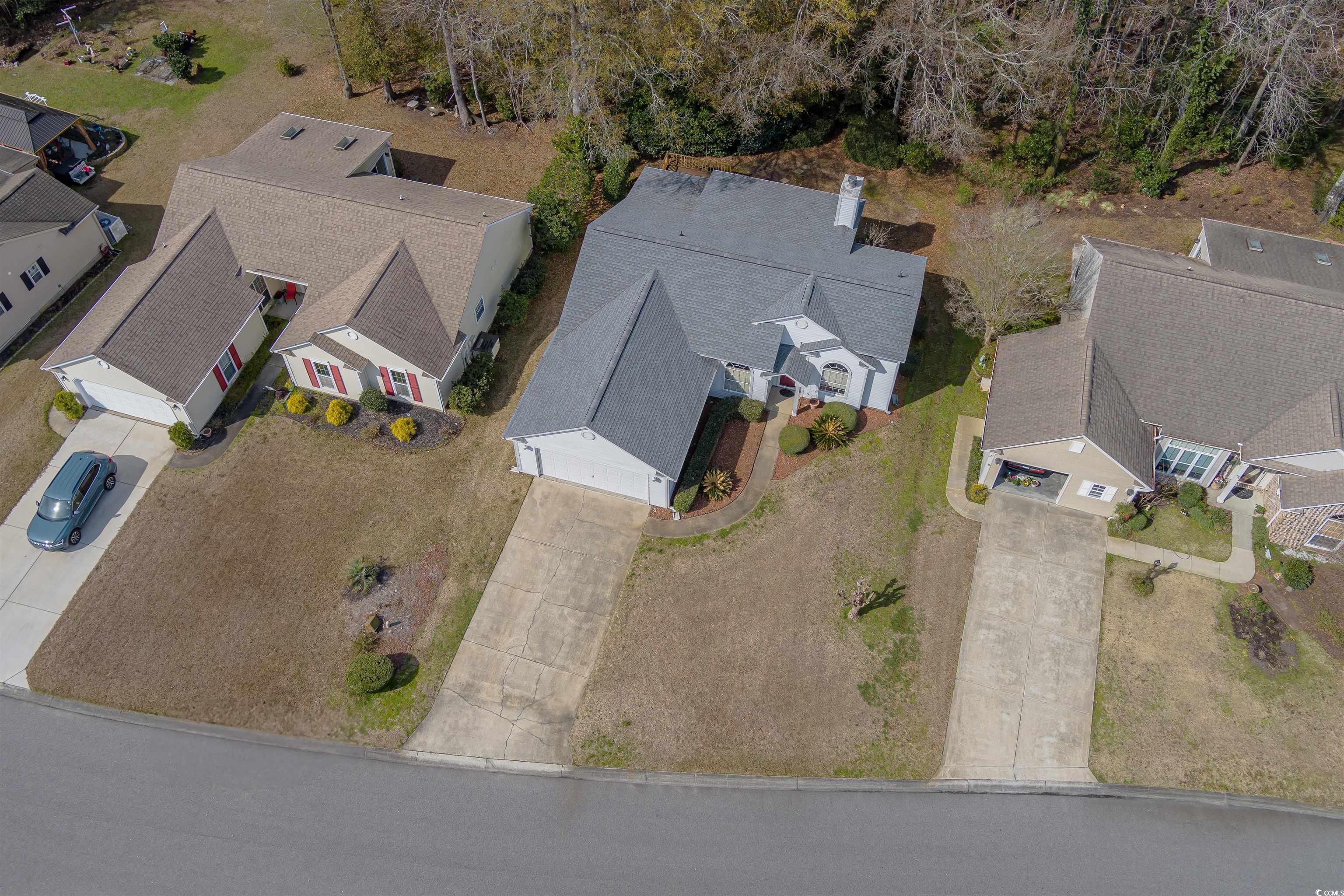 675 Bluebird Lane Murrells Inlet, SC 29576 - Photo 39 of 40 Drone / aerial view with a residential view