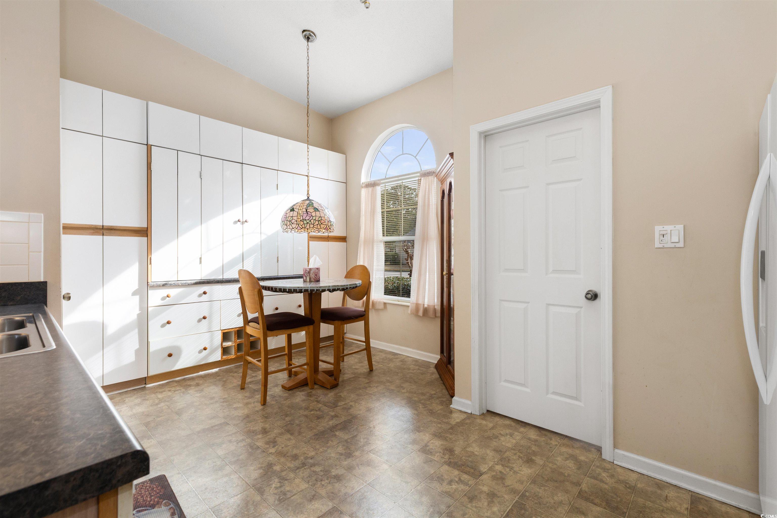 675 Bluebird Lane Murrells Inlet, SC 29576 - Photo 4 of 40 Dining space featuring baseboards