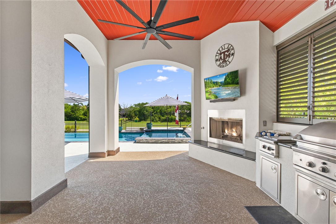 2833 Persimmon Ridge Court Bryan, TX 77807 - Photo 7 of 50 a view of a kitchen and a fireplace