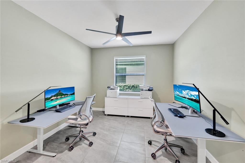 18298 Ridgeline Drive Estero, FL 33928 - Photo 26 of 49 Home office with a ceiling fan and baseboards