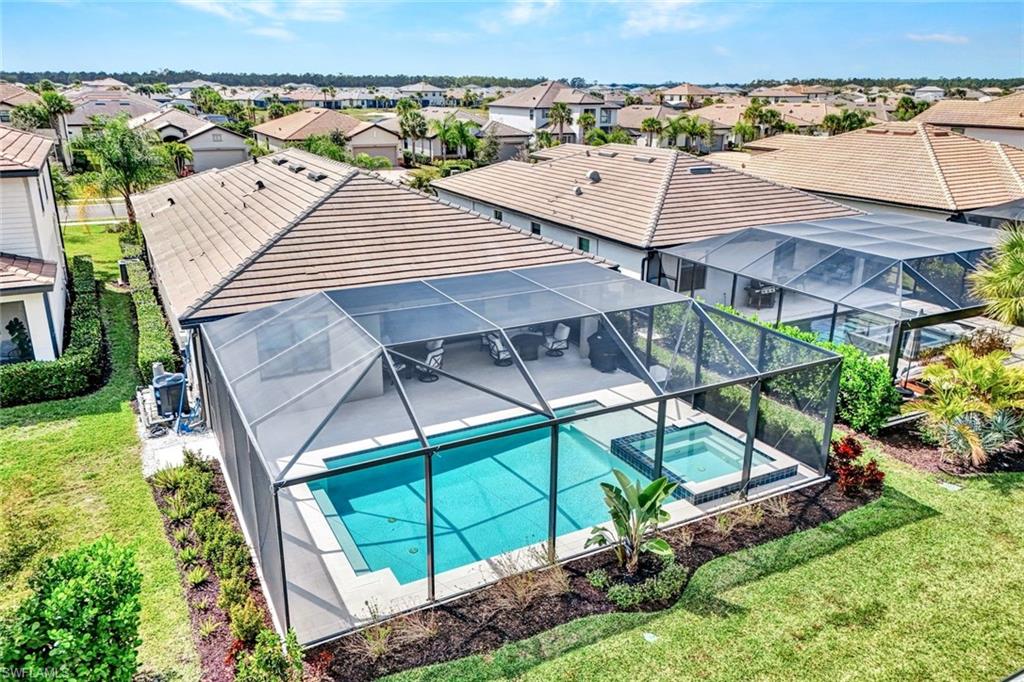 18298 Ridgeline Drive Estero, FL 33928 - Photo 38 of 49 Aerial perspective of suburban area featuring a pool area