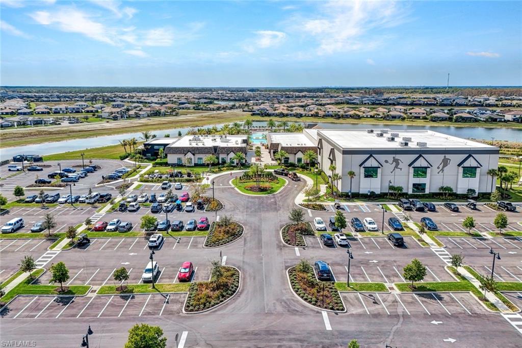 18298 Ridgeline Drive Estero, FL 33928 - Photo 49 of 49 Aerial perspective of suburban area featuring a large body of water