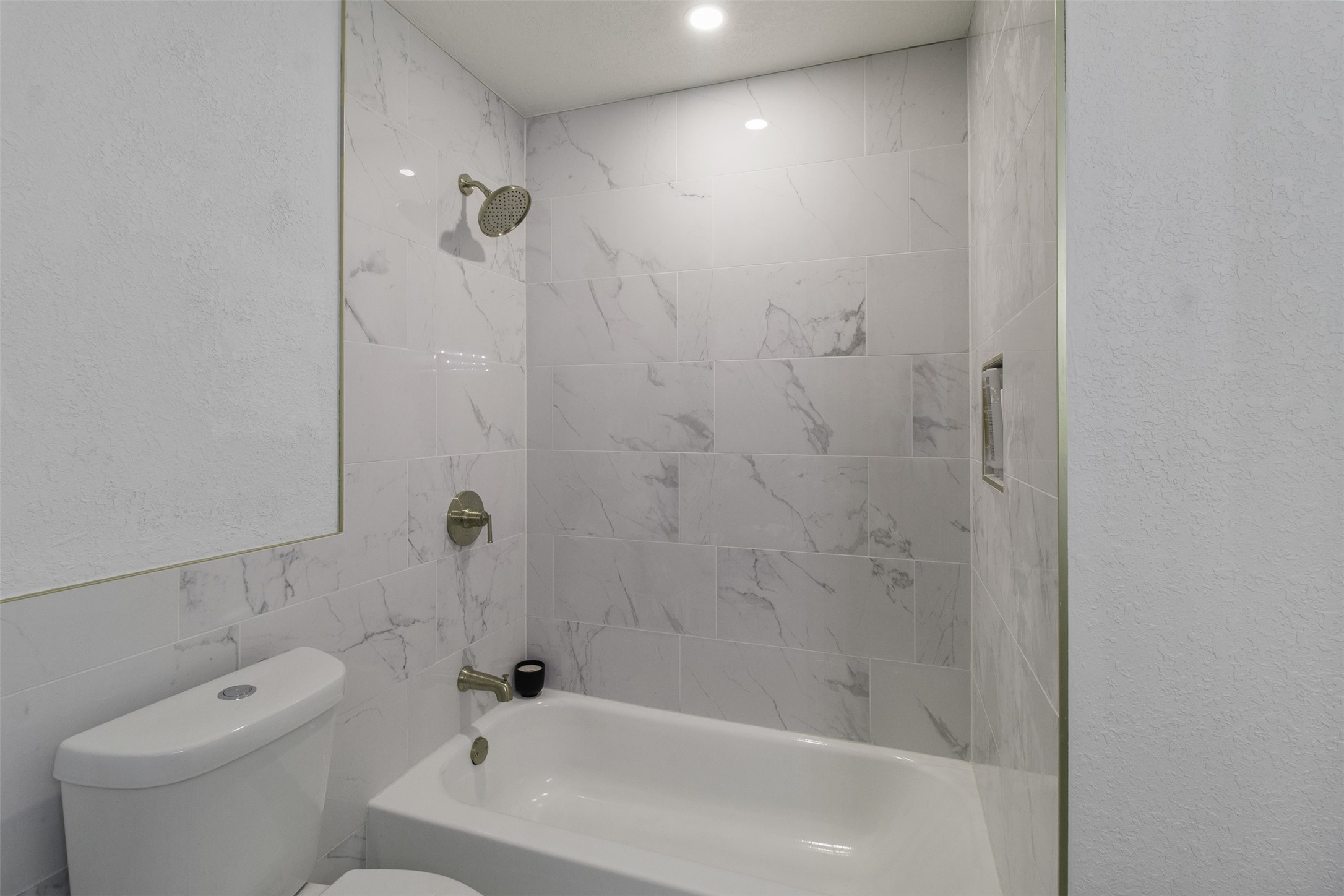 3908 Sierra Court Bryan, TX 77802 - Photo 18 of 27 a bathroom with a bathtub and shower