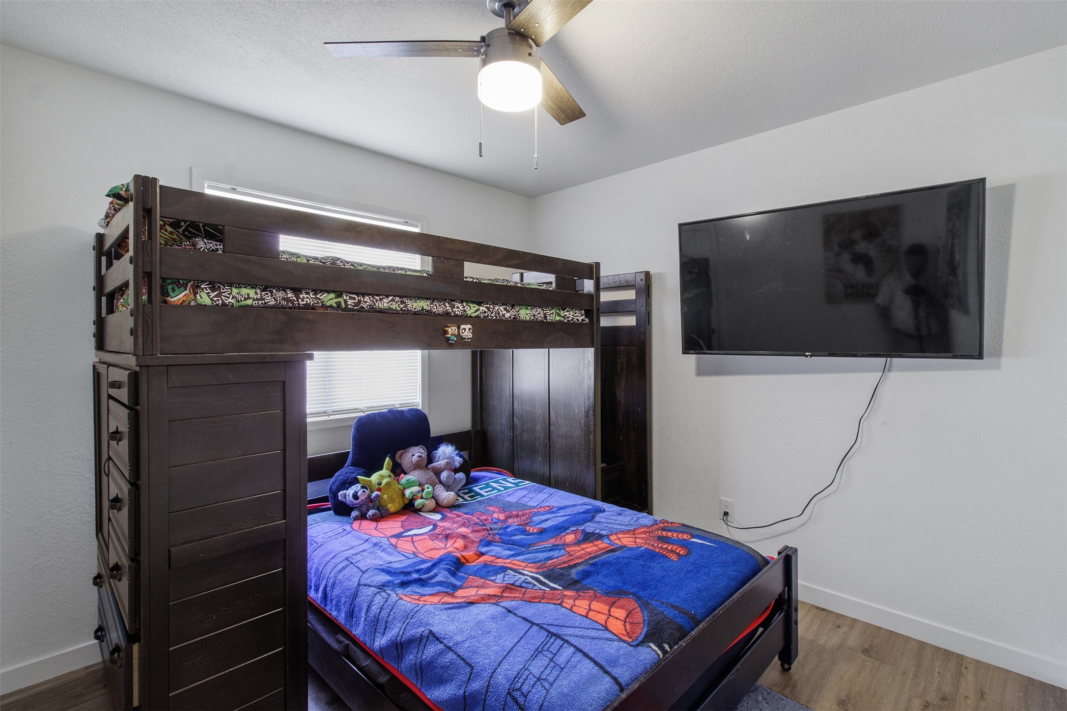 3908 Sierra Court Bryan, TX 77802 - Photo 20 of 27 a bed room with a bed and a television