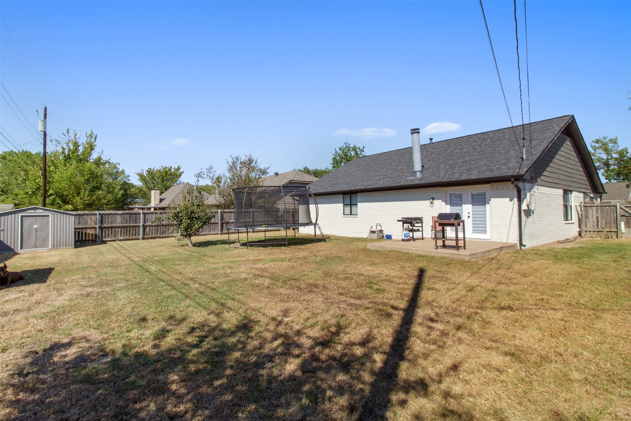 3908 Sierra Court Bryan, TX 77802 - Photo 26 of 27 a front view of a house with a yard
