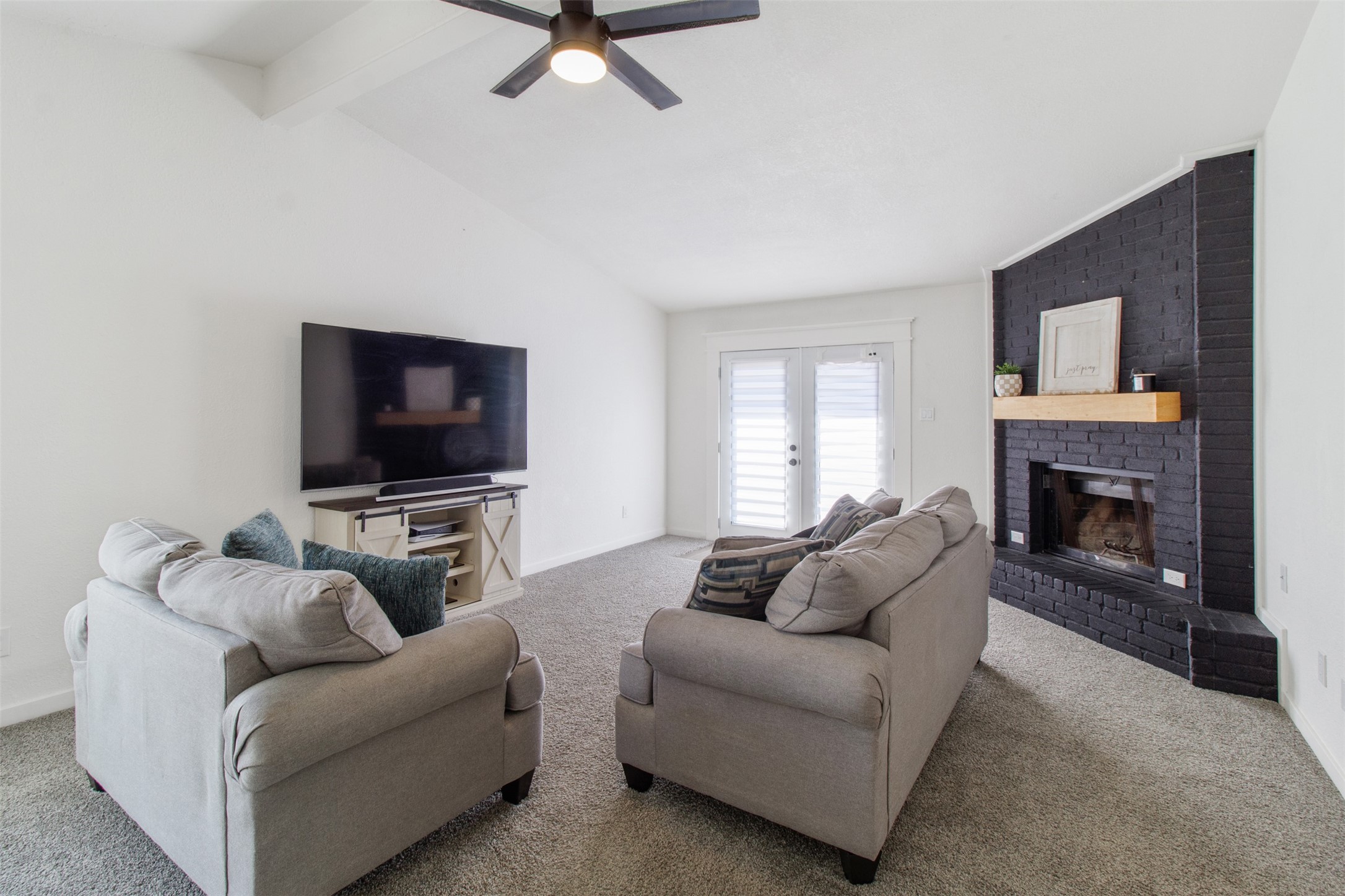 3908 Sierra Court Bryan, TX 77802 - Photo 7 of 27 a living room with furniture and a flat screen tv