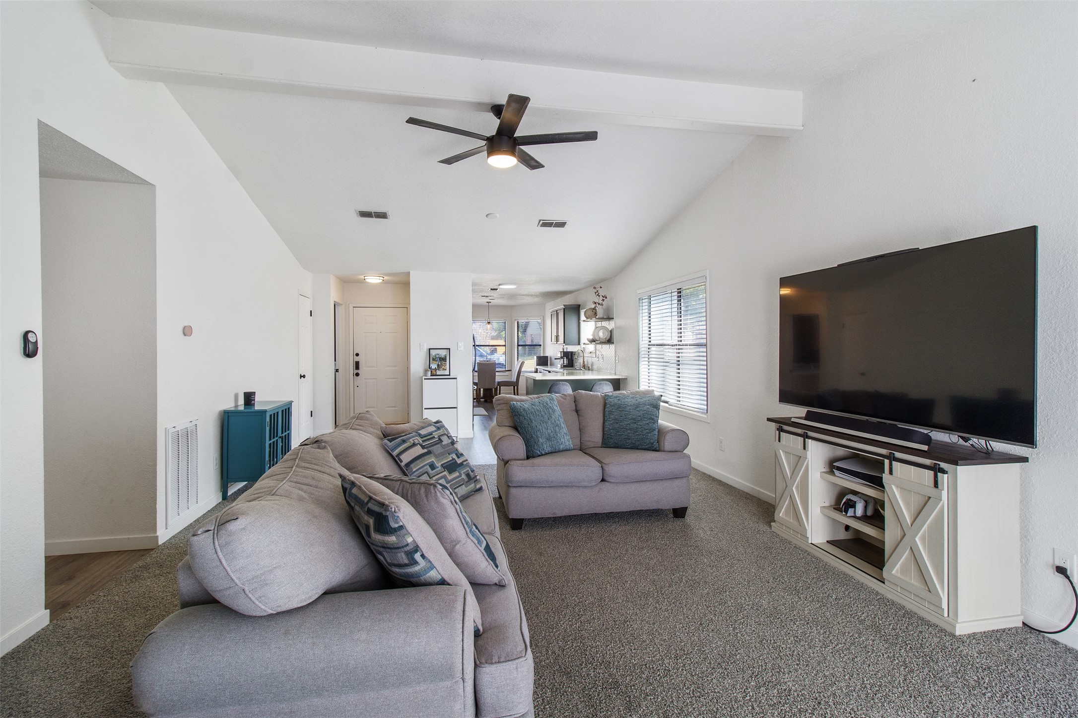 3908 Sierra Court Bryan, TX 77802 - Photo 9 of 27 a living room with furniture and a flat screen tv