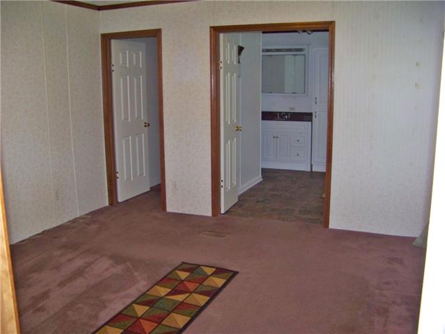 1636 Bend Road Clarksville, TN 37040 - Photo 8 of 20 THE MASTER BEDROOM FEATURES A BIG WALK-IN CLOSET AND A PRIVATE BATH.