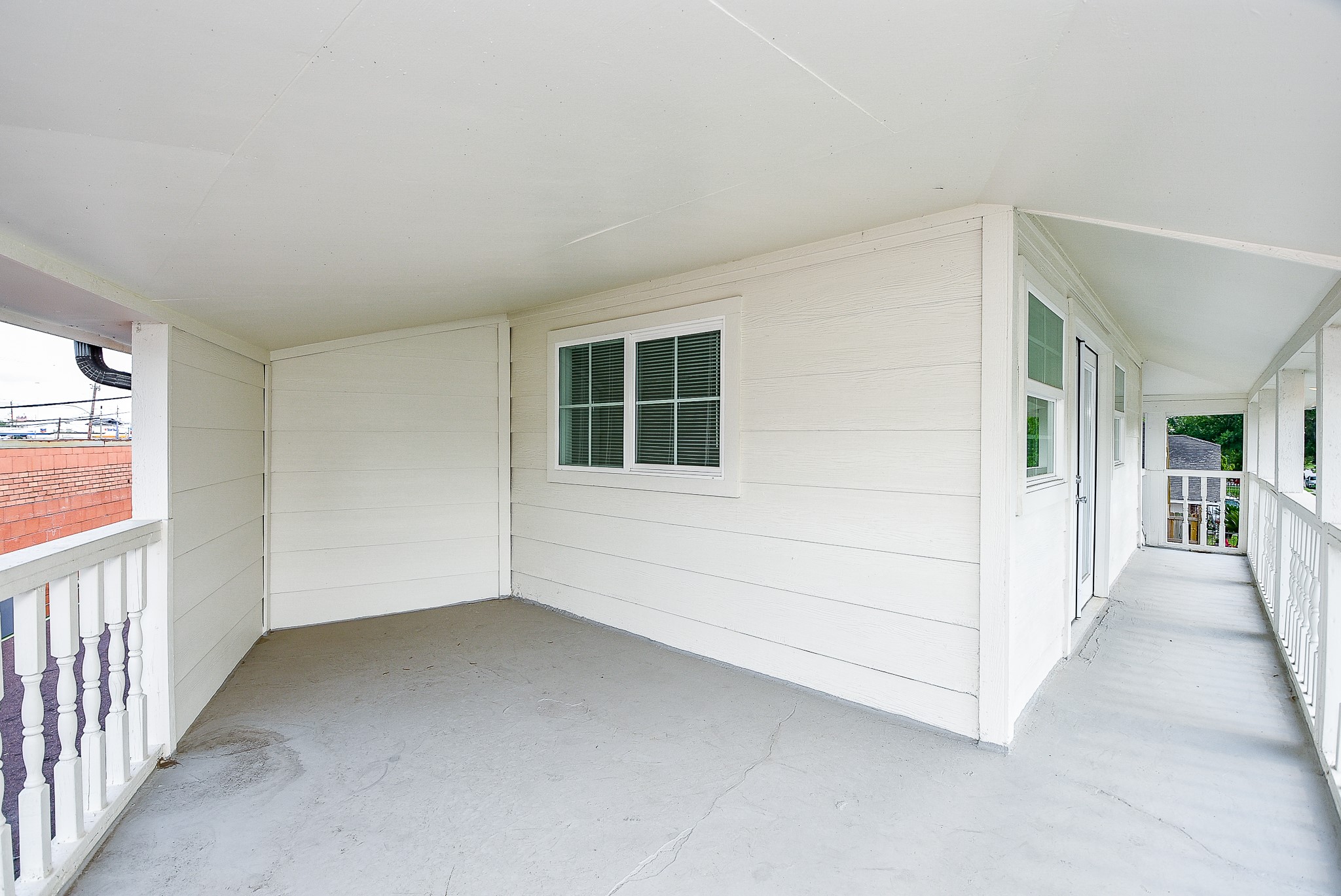 2509 Oakcliff Street Houston, TX 77023 - Photo 26 of 31 a view of a livingroom with an empty space and a window