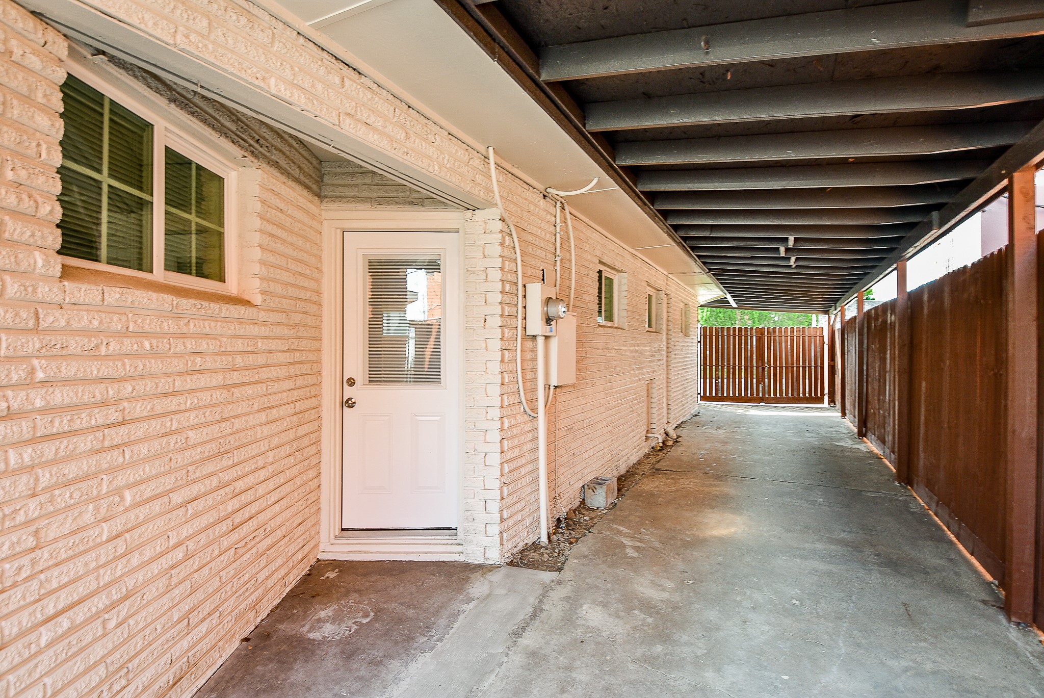 2509 Oakcliff Street Houston, TX 77023 - Photo 4 of 31 a view of a house with wooden fence