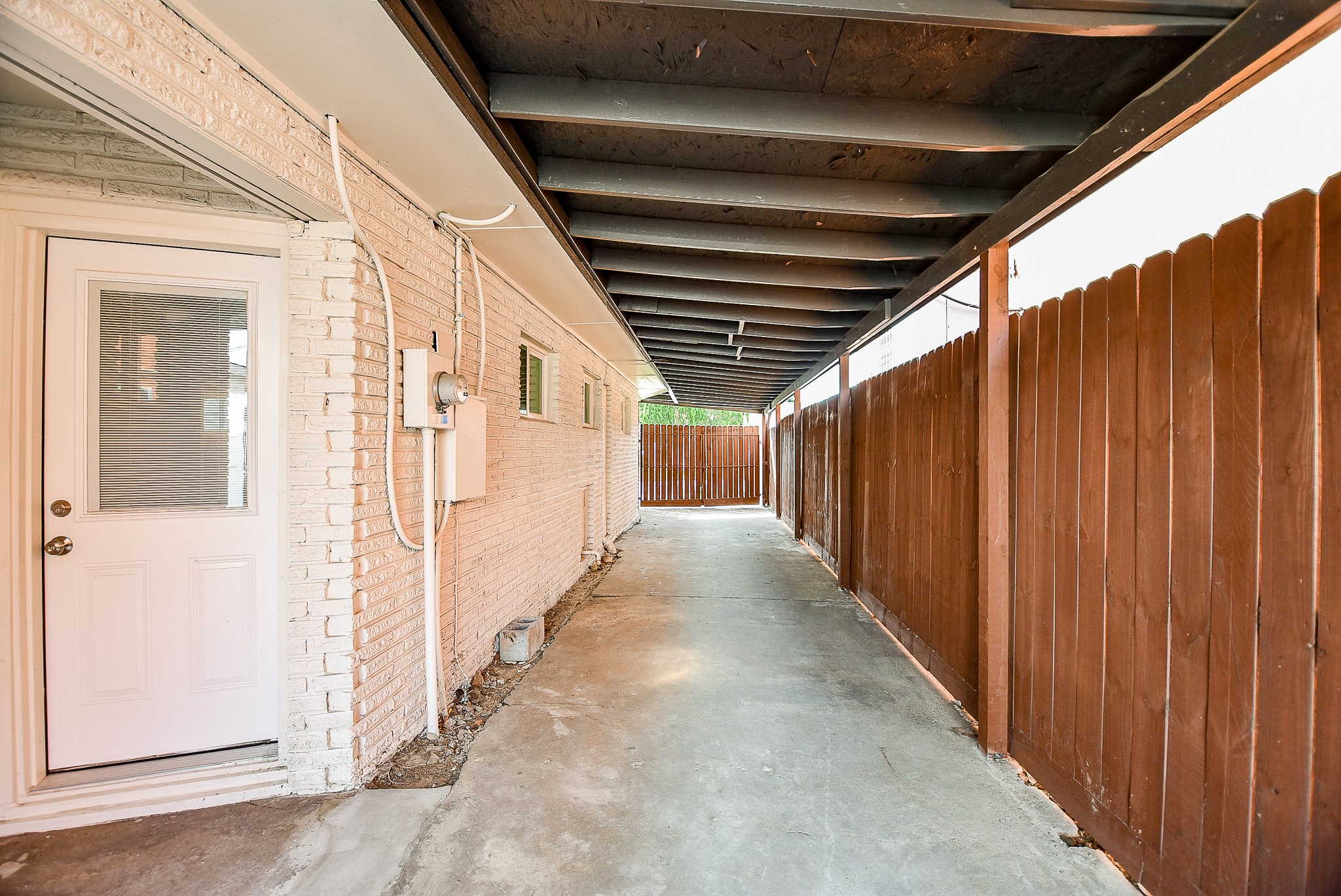 2509 Oakcliff Street Houston, TX 77023 - Photo 5 of 31 a view of a back yard with wooden fence
