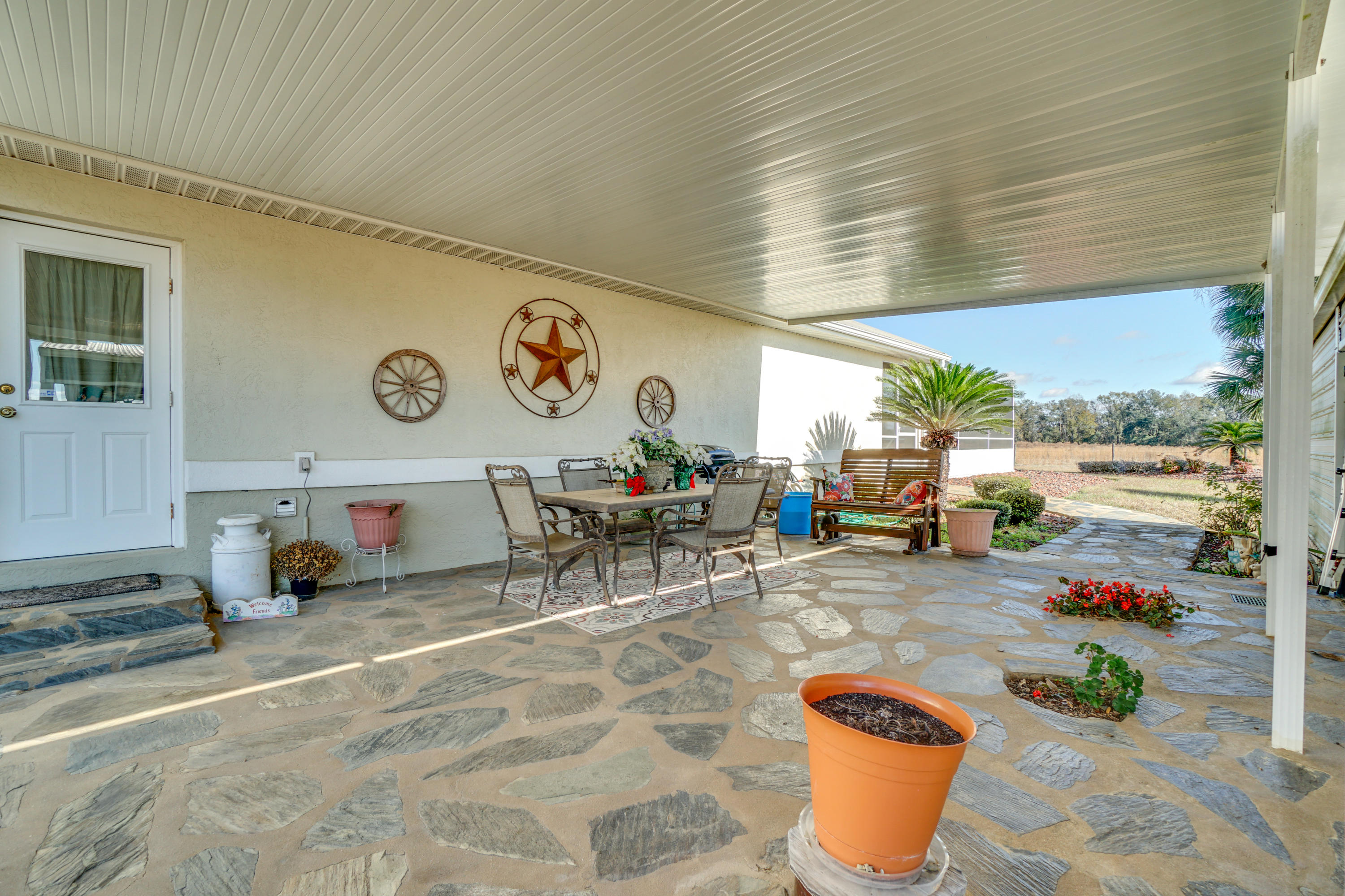 1940 Eldridge Road Cottondale, FL 32431 - Photo 12 of 42 a outdoor space with lots of furniture and clutter