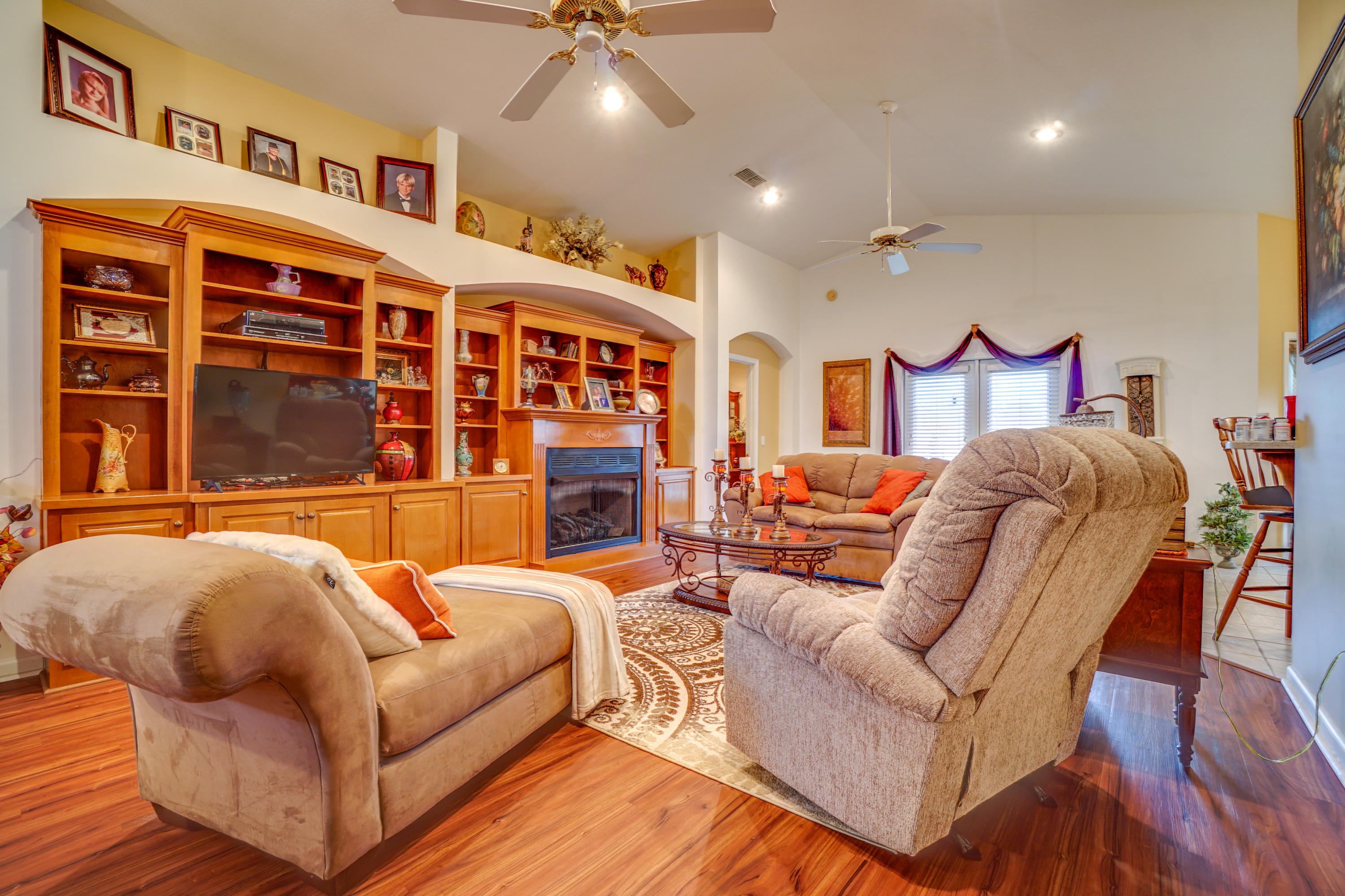 1940 Eldridge Road Cottondale, FL 32431 - Photo 14 of 42 a living room with furniture a chandelier and a floor to ceiling window