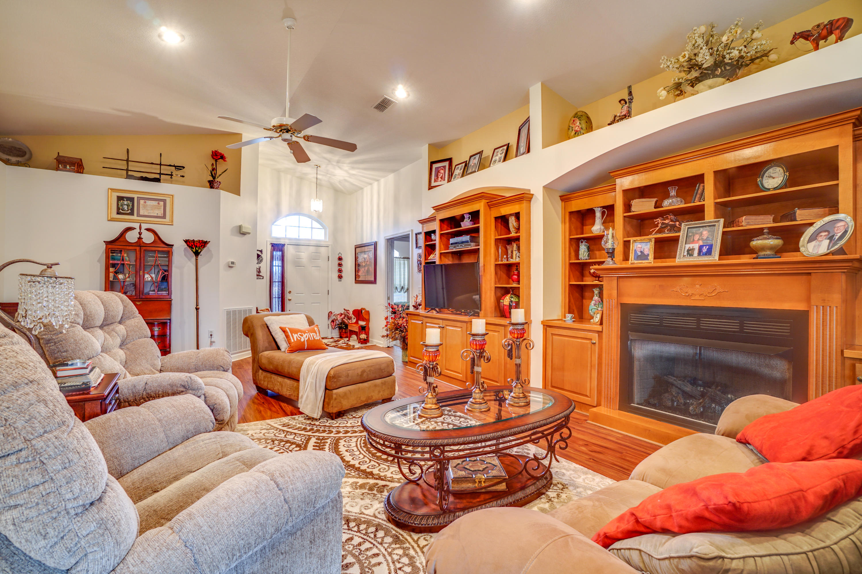 1940 Eldridge Road Cottondale, FL 32431 - Photo 15 of 42 a living room with furniture and a fireplace
