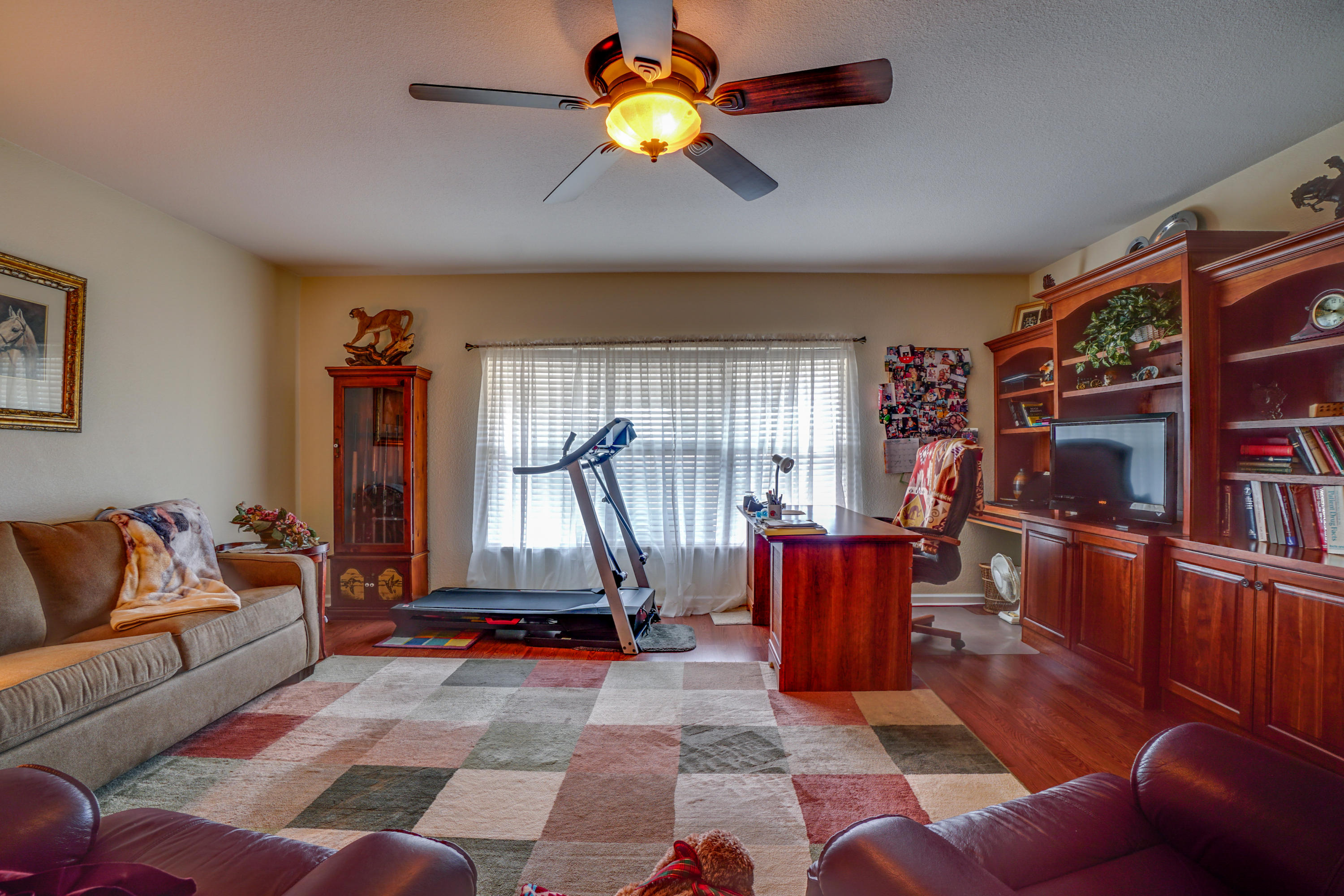 1940 Eldridge Road Cottondale, FL 32431 - Photo 23 of 42 a living room with furniture and a flat screen tv