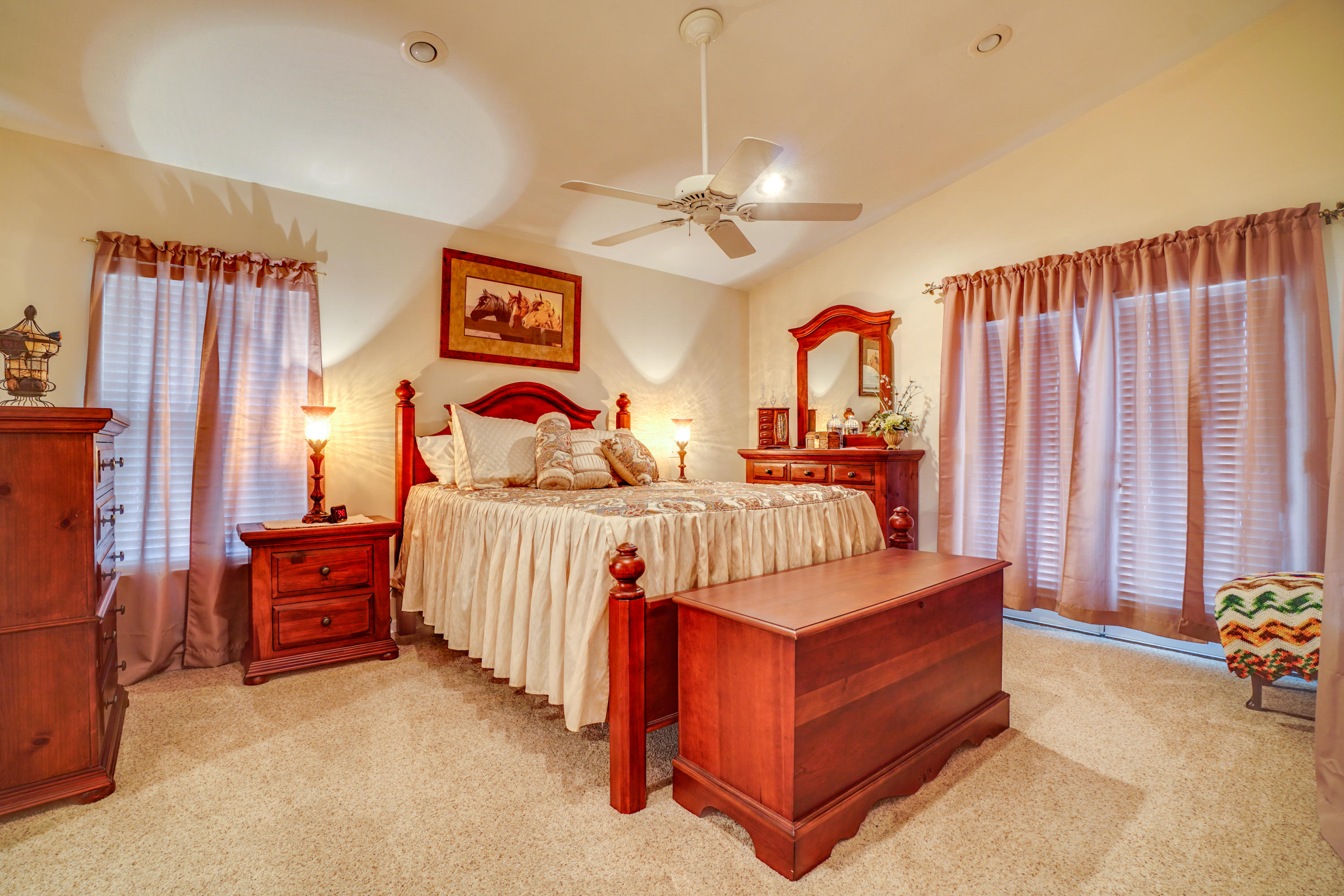 1940 Eldridge Road Cottondale, FL 32431 - Photo 26 of 42 a bedroom with a bed and a chandelier