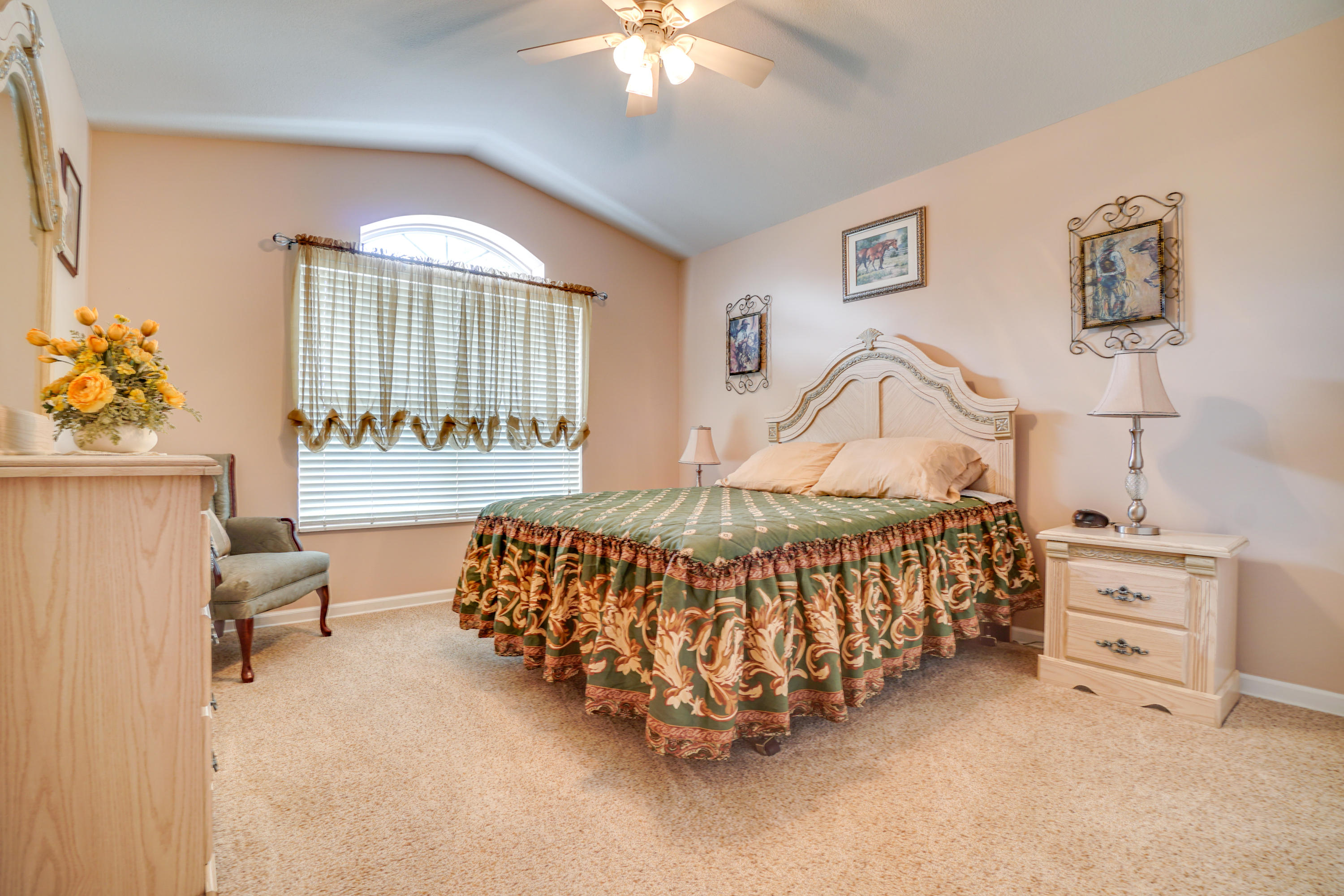 1940 Eldridge Road Cottondale, FL 32431 - Photo 32 of 42 a bedroom with a bed window and couch