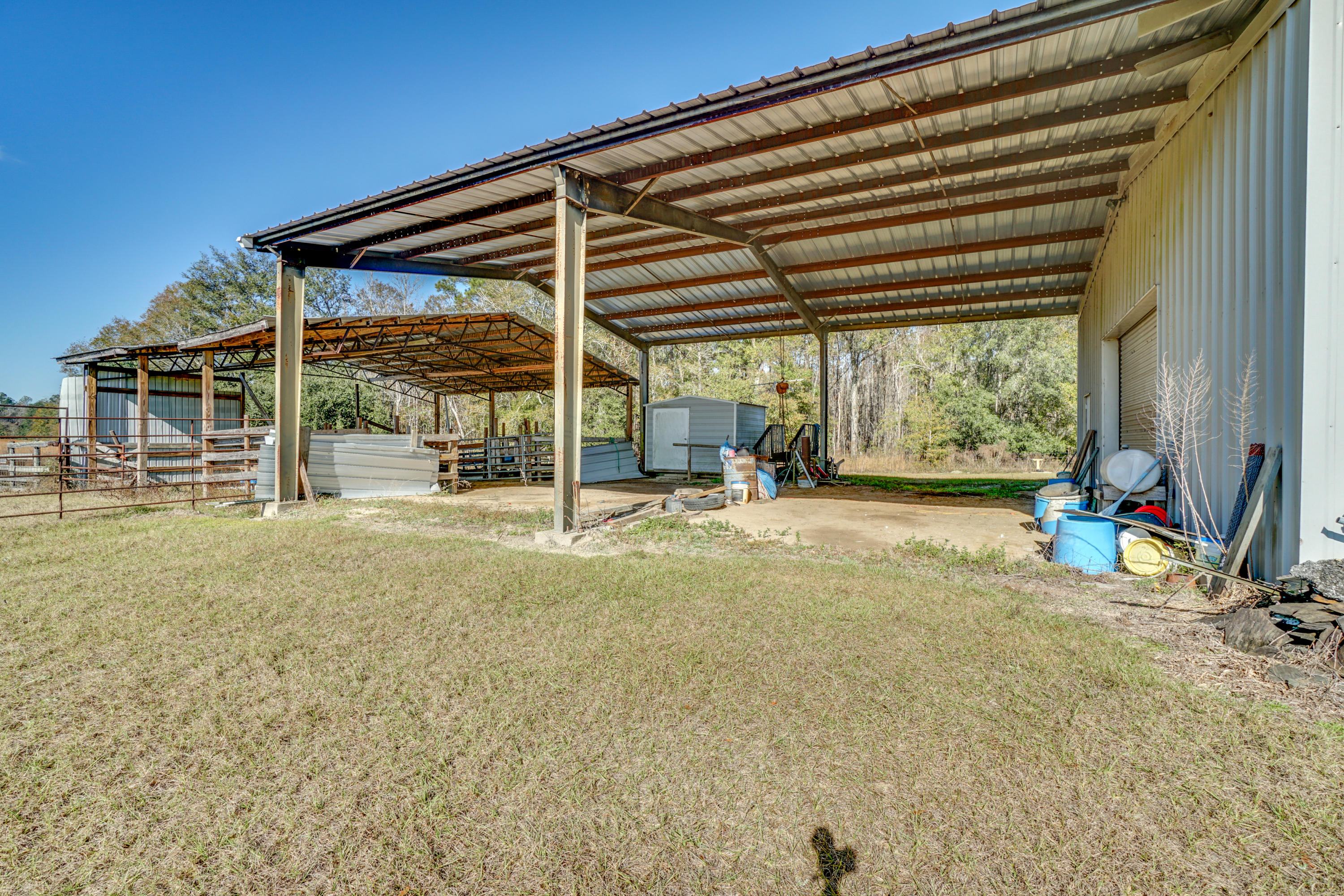 1940 Eldridge Road Cottondale, FL 32431 - Photo 42 of 42 a view of a house with a backyard and a porch