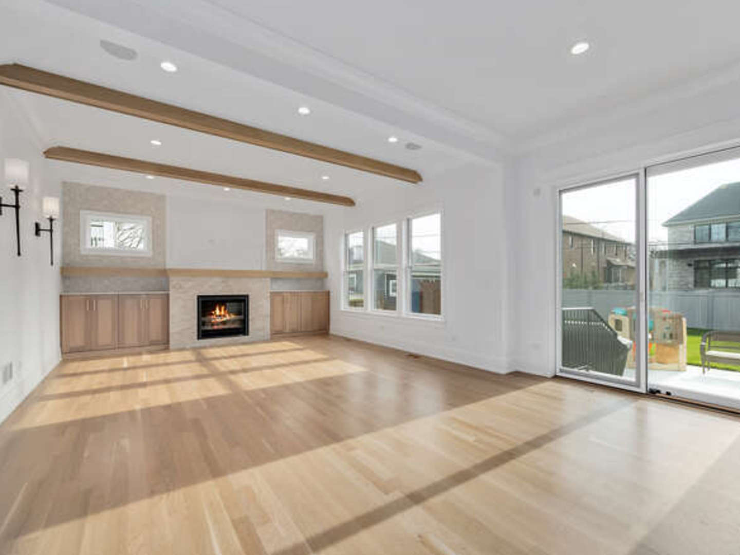570 Parkside Avenue Elmhurst, IL 60126 - Photo 11 of 22 a view of an empty room with a fireplace and a window