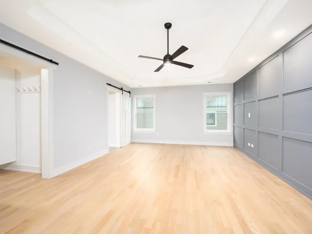 a view of empty room with windows