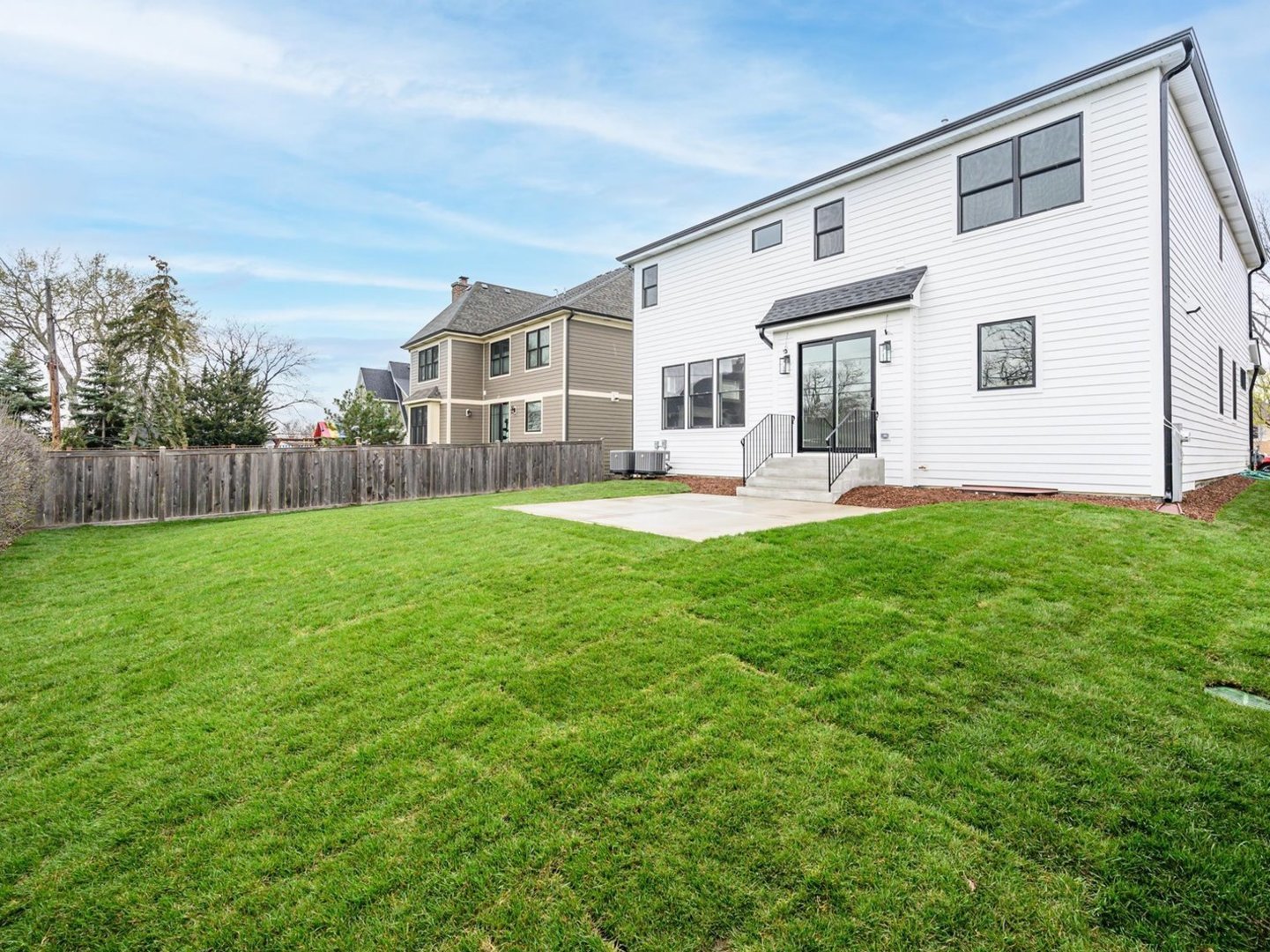 570 Parkside Avenue Elmhurst, IL 60126 - Photo 22 of 22 a front view of house with yard and seating area