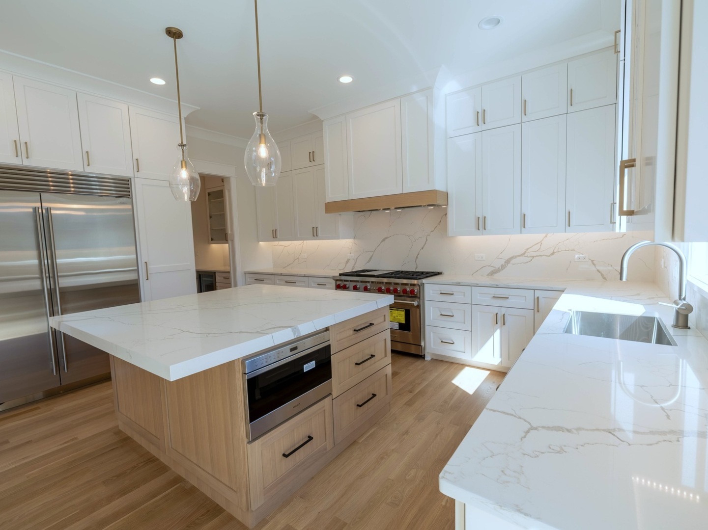 570 Parkside Avenue Elmhurst, IL 60126 - Photo 4 of 22 a kitchen with a stove a refrigerator and a sink