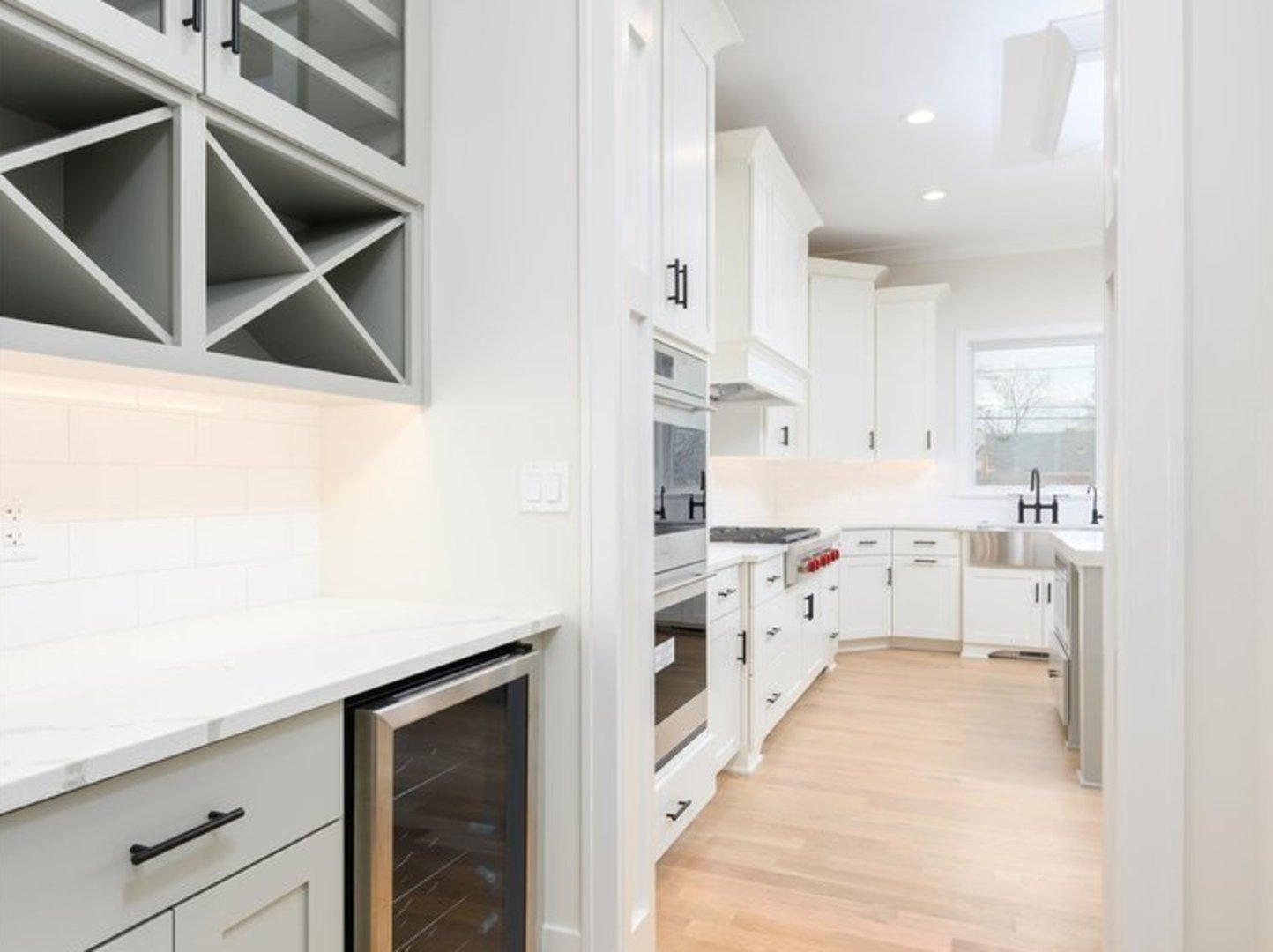 570 Parkside Avenue Elmhurst, IL 60126 - Photo 7 of 22 a kitchen with white cabinets and white appliances