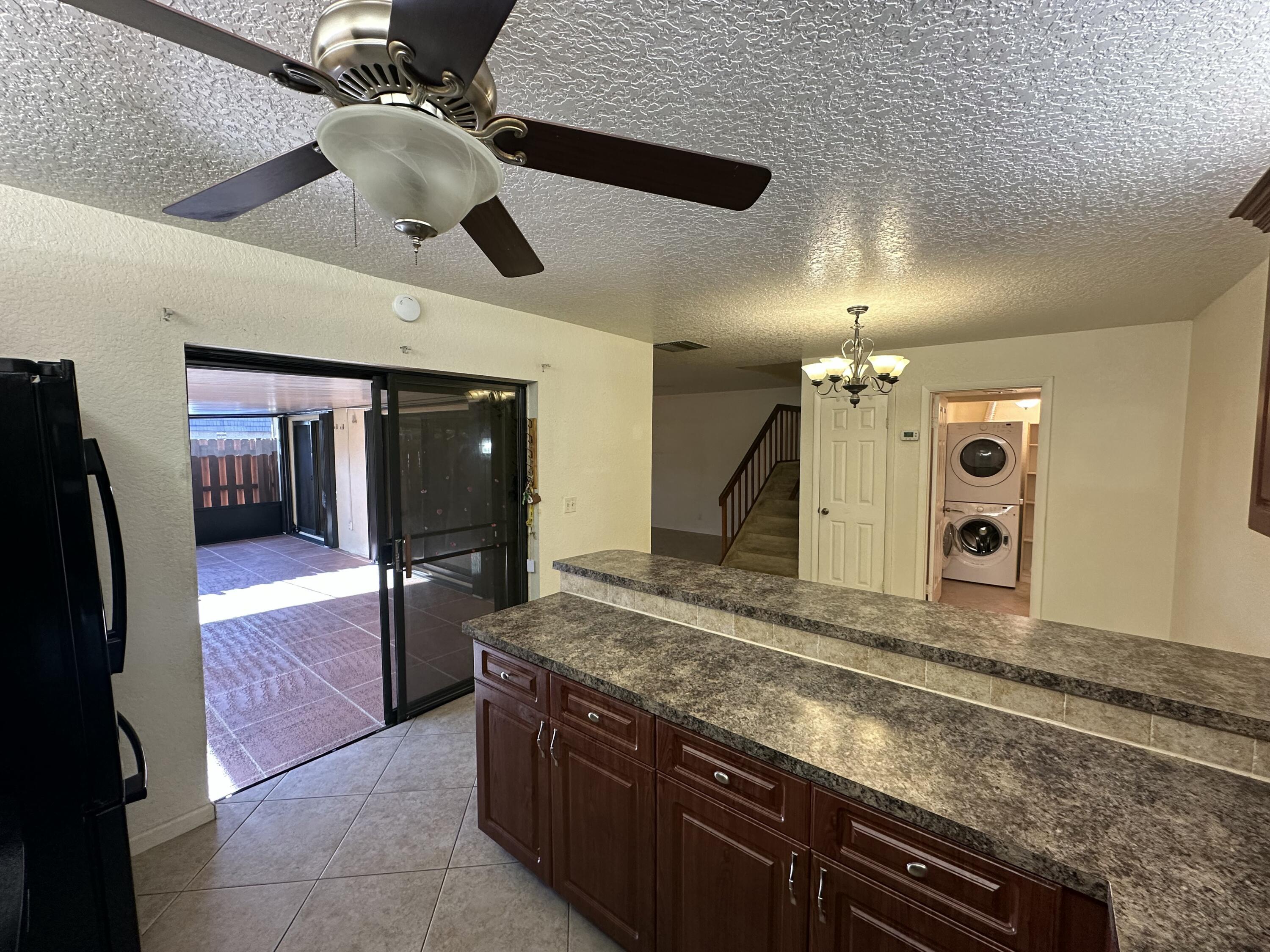622 Springdale Circle Palm Springs, FL 33461 - Photo 10 of 13 a bathroom with a granite countertop sink