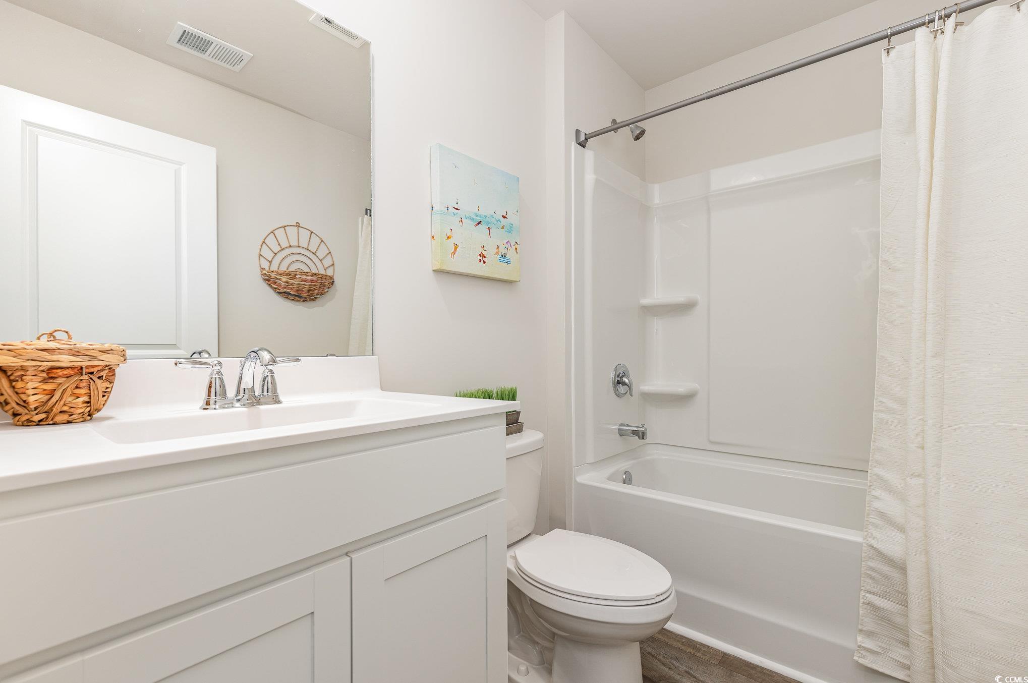 284 Long Beard Way Loris, SC 29569 - Photo 19 of 40 Full bathroom with shower / tub combo with curtain and vanity