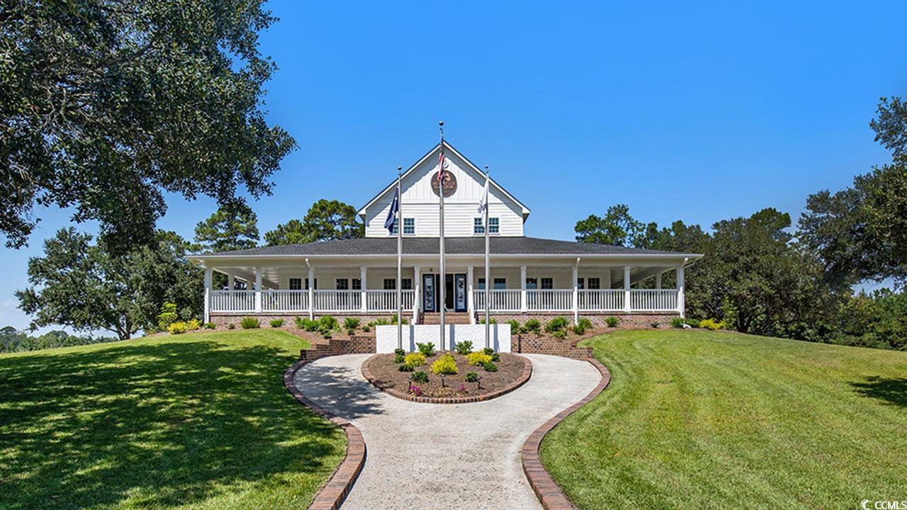 284 Long Beard Way Loris, SC 29569 - Photo 23 of 40 Country-style home with a front yard and a large porch