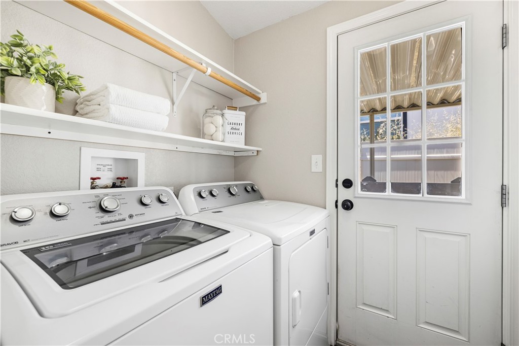 30000 Hasley Canyon Road, Unit 44 Valencia, CA 91384 - Photo 12 of 29 Laundry room and access to carport