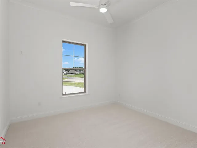 a view of a window in an empty room