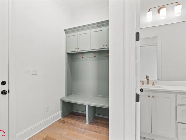 a view of a hallway with closet