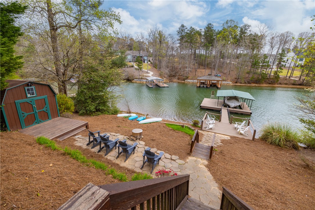 203 Little Lane Seneca, SC 29672 - Photo 34 of 48 This captivating lakefront property features a private dock and a tranquil setting for waterside enjoyment.