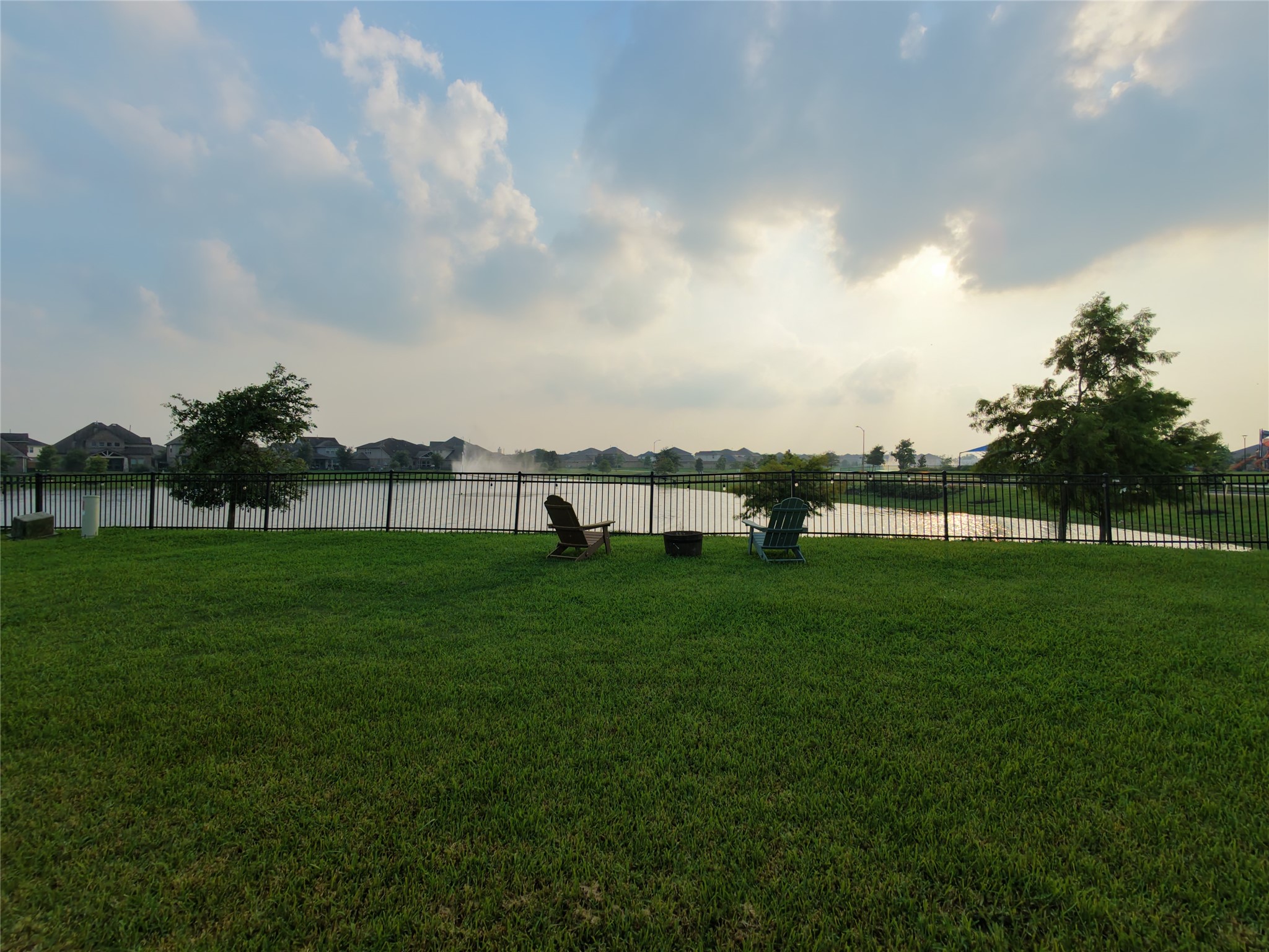 10142 Whitney Reach Drive Rosharon, TX 77583 - Photo 23 of 26 a view of a grassy field