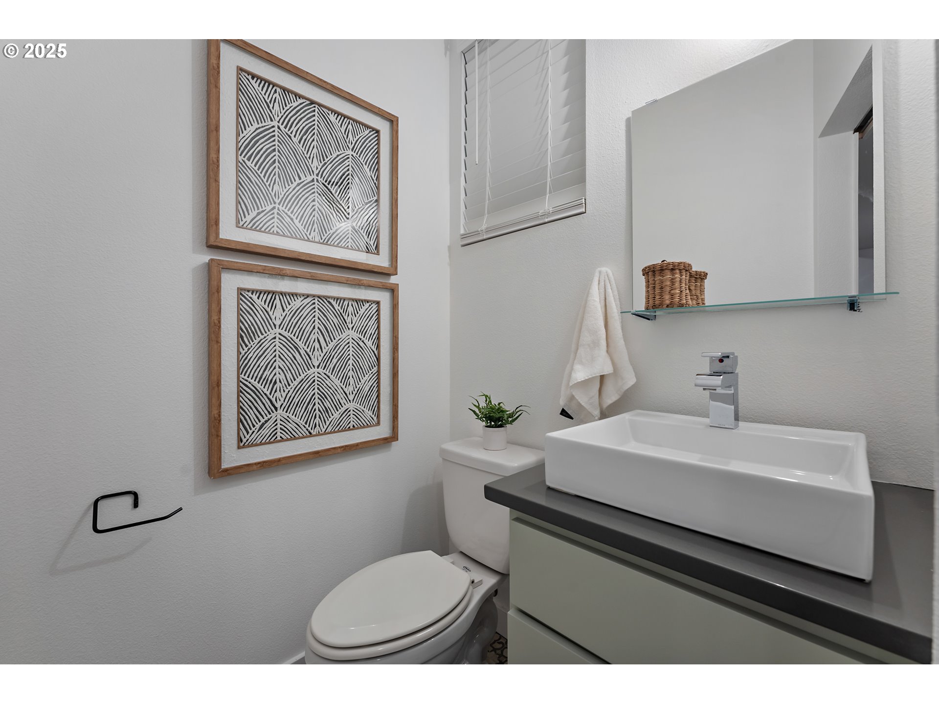 4303 Southeast Division Street Portland, OR 97206 - Photo 15 of 40 a bathroom with a sink mirror vanity and toilet