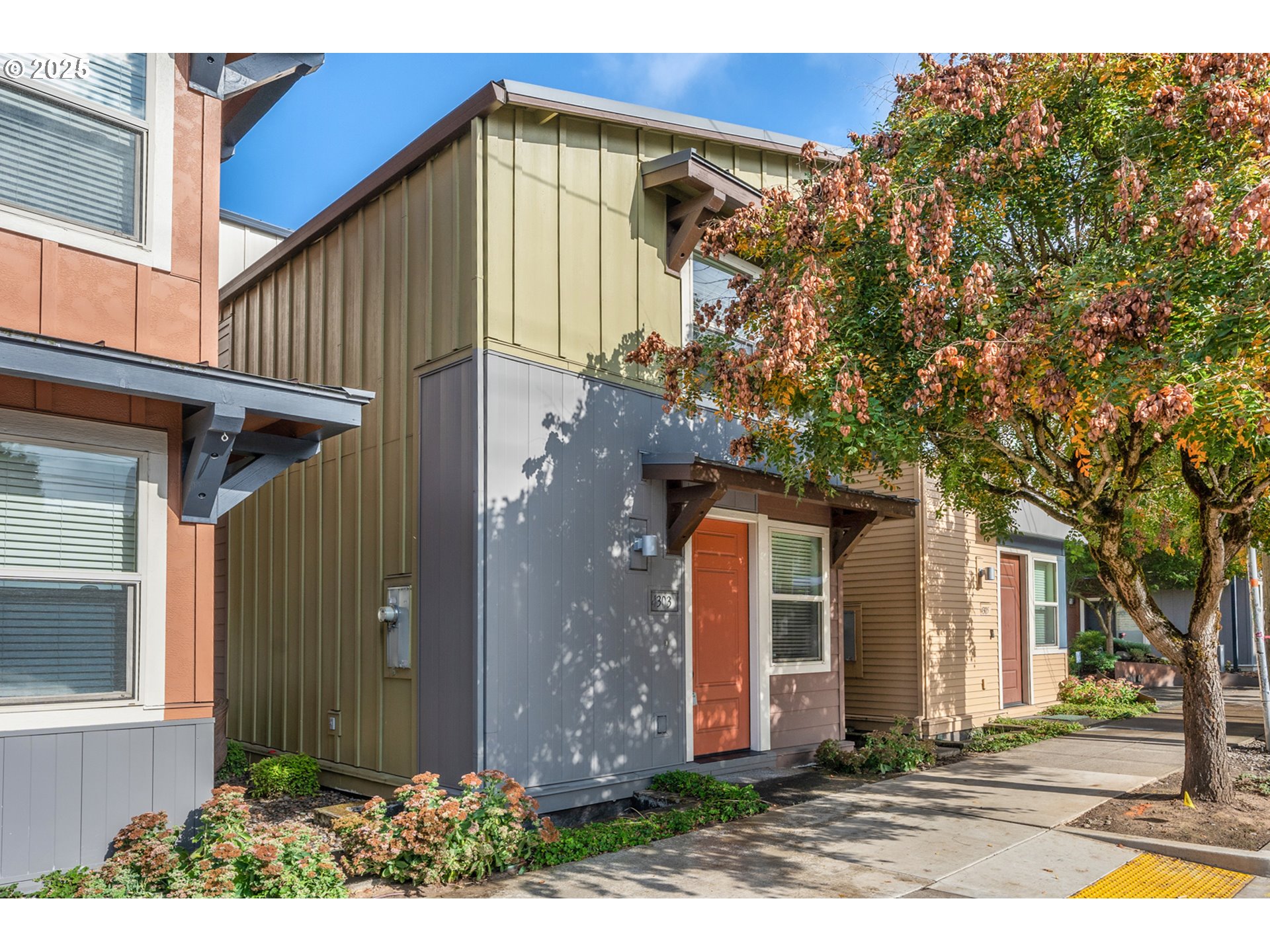 4303 Southeast Division Street Portland, OR 97206 - Photo 2 of 40 a view of a house with a yard