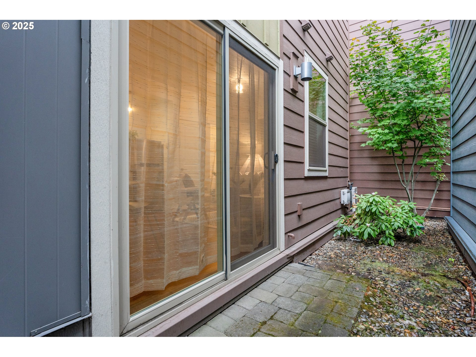 4303 Southeast Division Street Portland, OR 97206 - Photo 36 of 40 a view of a back yard from a room