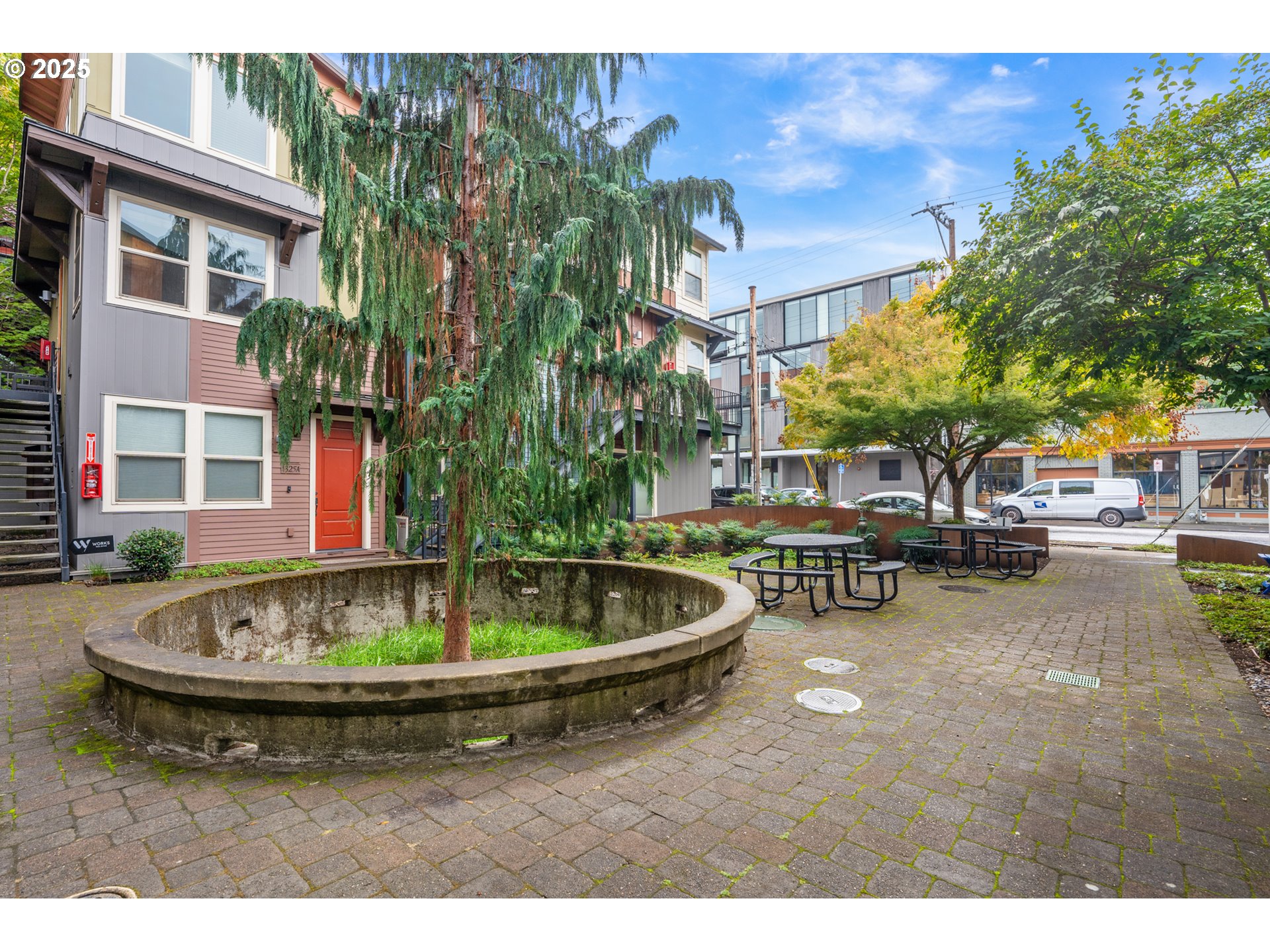 4303 Southeast Division Street Portland, OR 97206 - Photo 39 of 40 a swimming pool with outdoor seating and yard