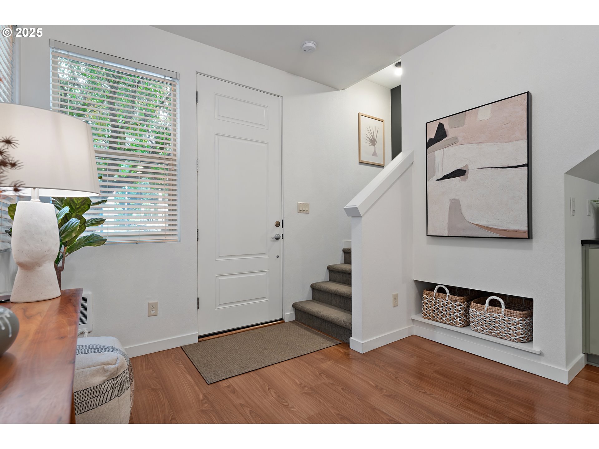 4303 Southeast Division Street Portland, OR 97206 - Photo 5 of 40 a view of an entryway with wooden floor