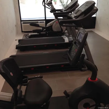 a view of a room with gym equipment