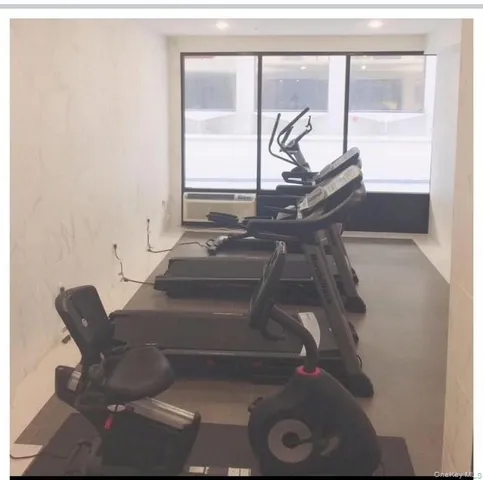 a front view of a building with a lots of windows