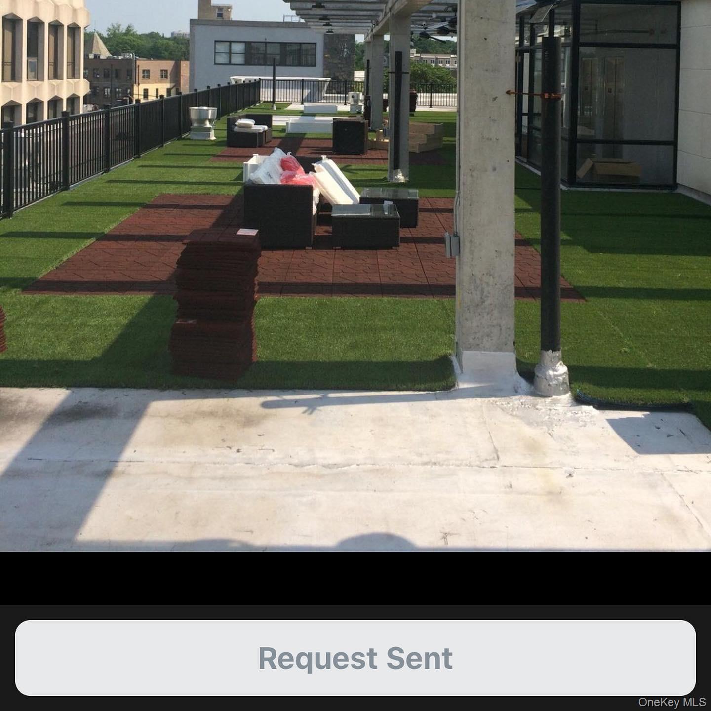 5 Grace Avenue, Unit 2J Great Neck, NY 11021 - Photo 2 of 15 a view of outdoor space with garden