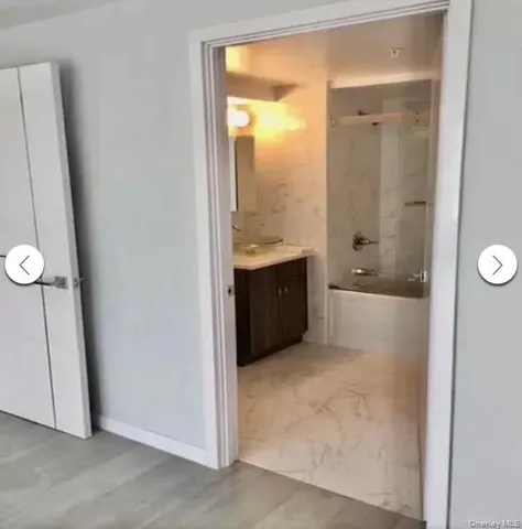 a kitchen with a sink stove and microwave