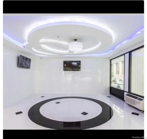 a view of room with air conditioner and window