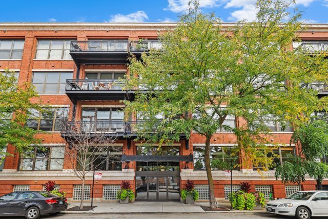 a front view of a building with street view