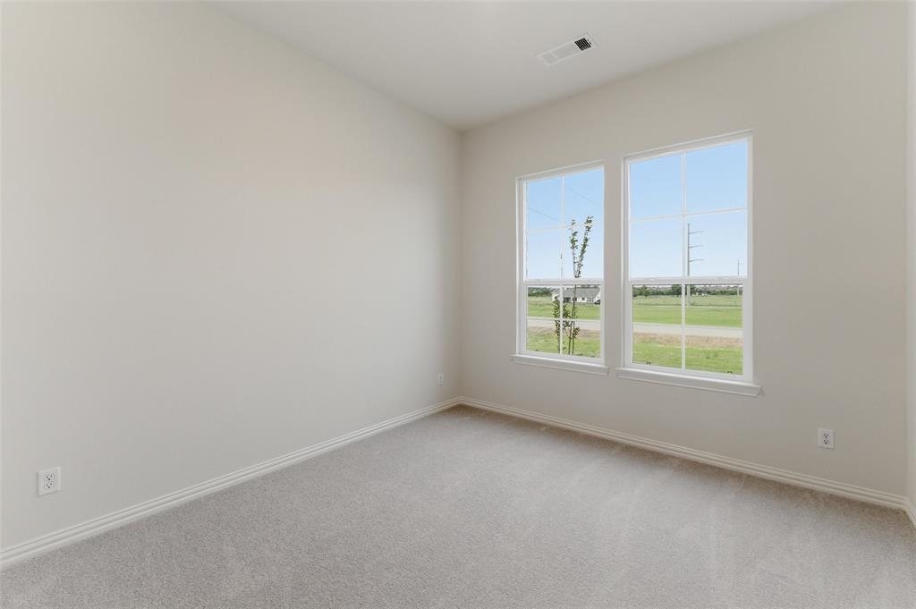 119 Hillview Trail Decatur, TX 76234 - Photo 14 of 30 Room with neutral wall color, light gray carpeting, and white baseboards