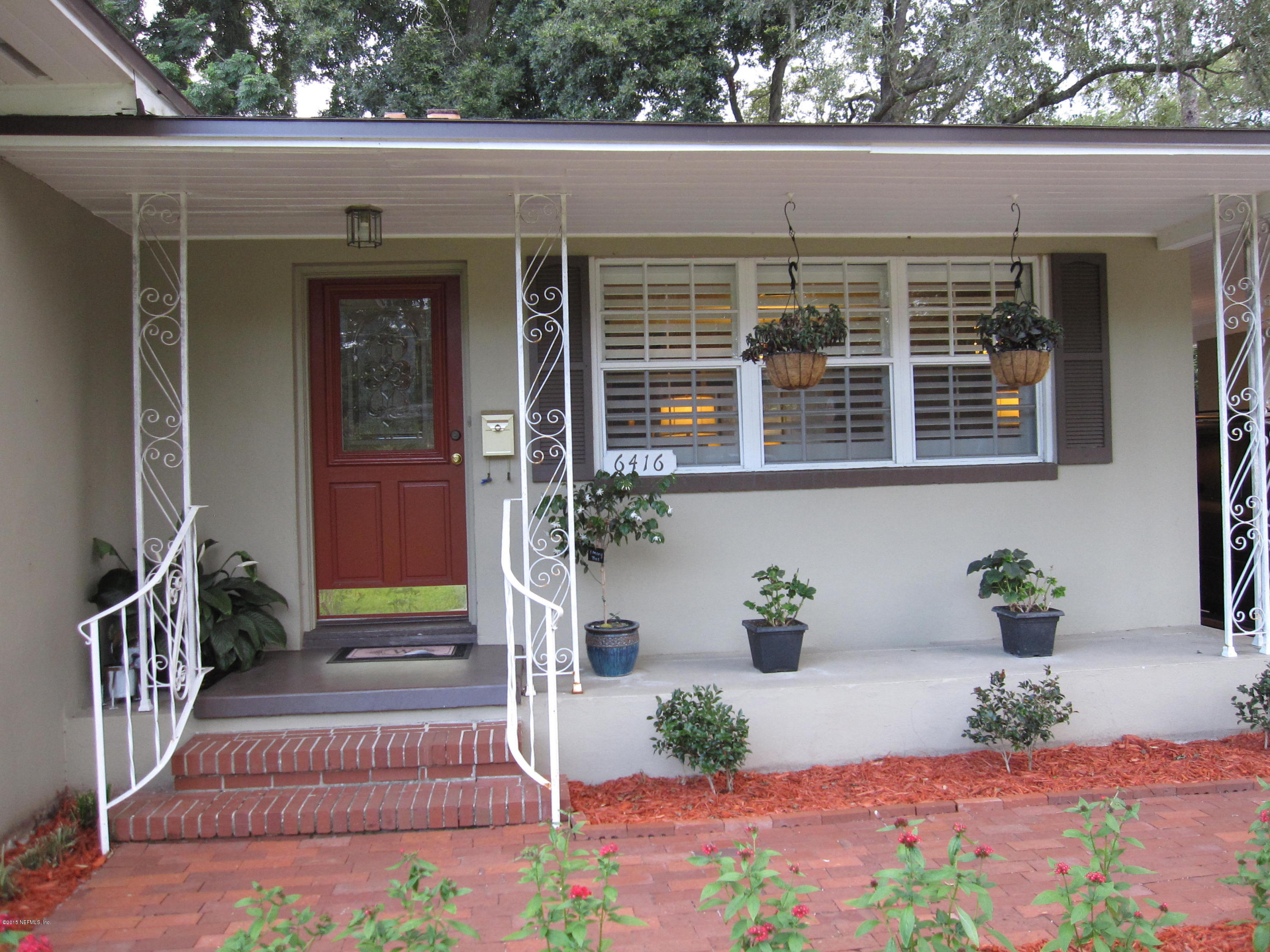 6416 Wesleyan Road Jacksonville, FL 32217 - Photo 1 of 35 a view of a house with potted plants